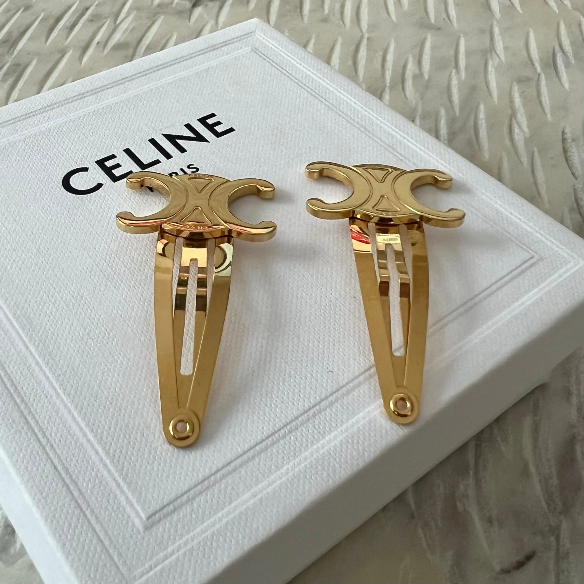 CELINE HAIR ACCESSORIES SET OF 2 TRIOMPHE SNAP HAIR CLIPS IN BRASS WITH GOLD FINISH AND STEEL-GOLD