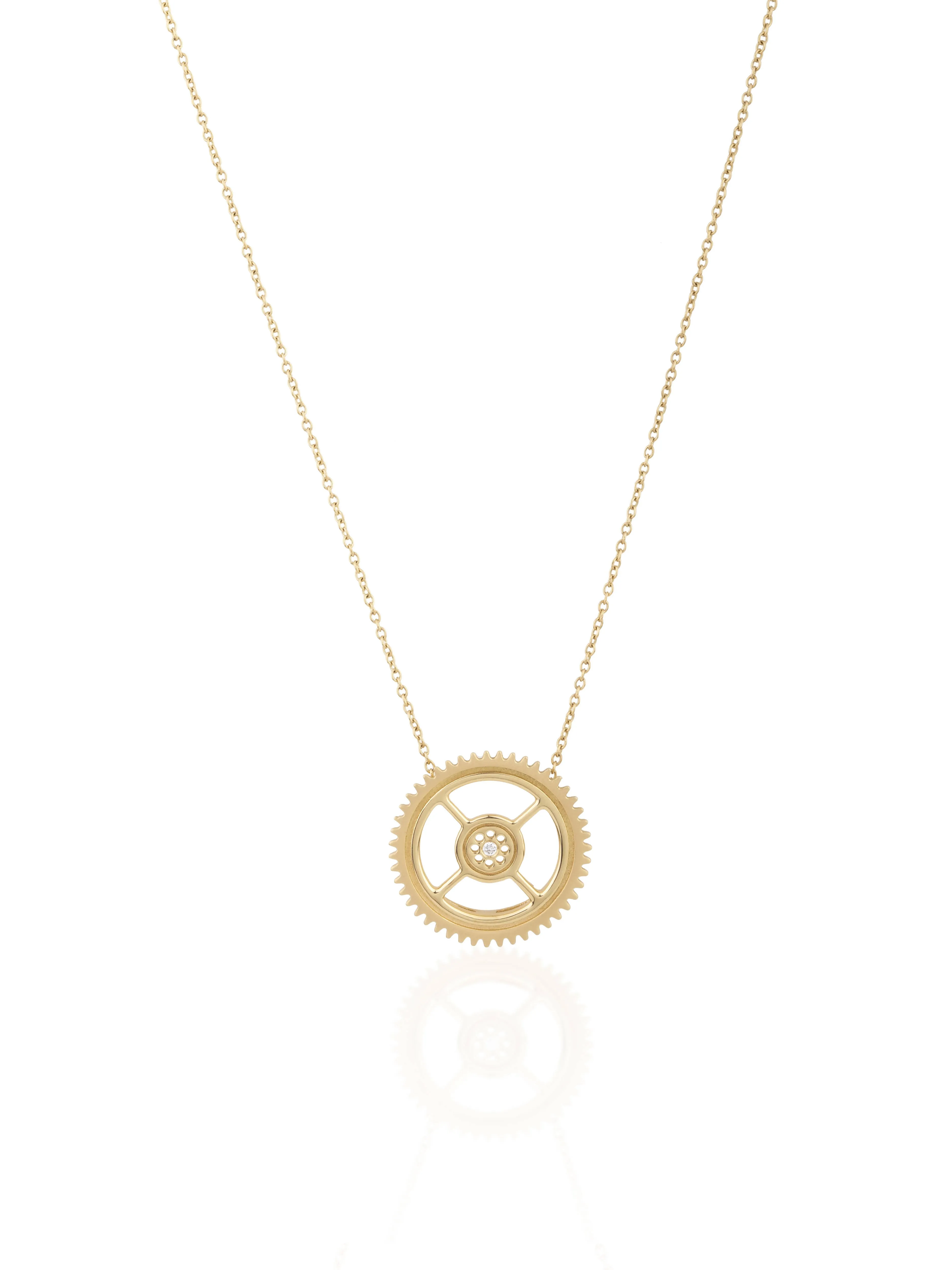 gold-uno-large-gear-necklace - By Delcy